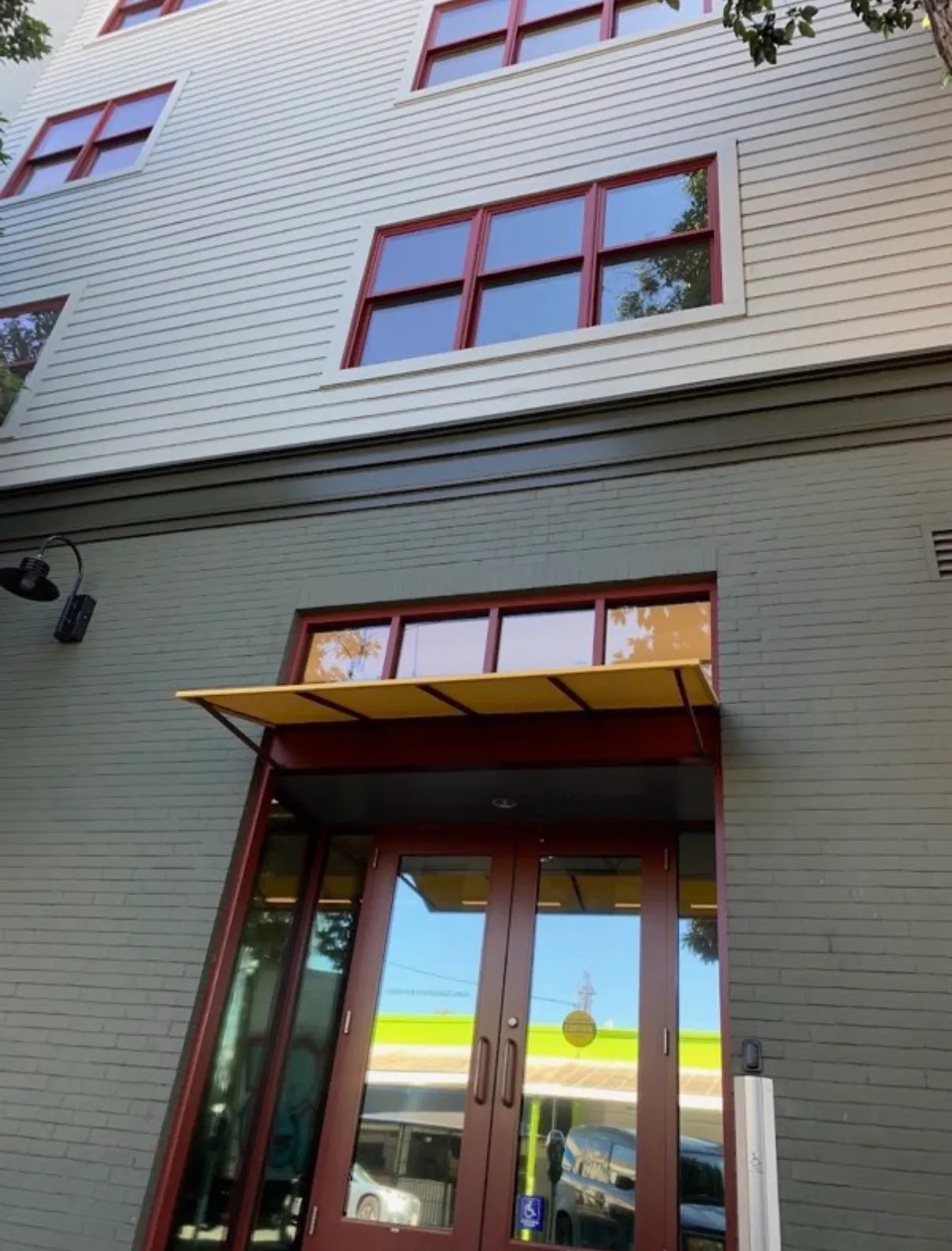Exterior windows cleaned on a multi-storey building entrance